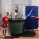 Teen volunteers have fun using the dunk tank during City Trekker Summer Camp 2014 at the Coral Gables Museum.